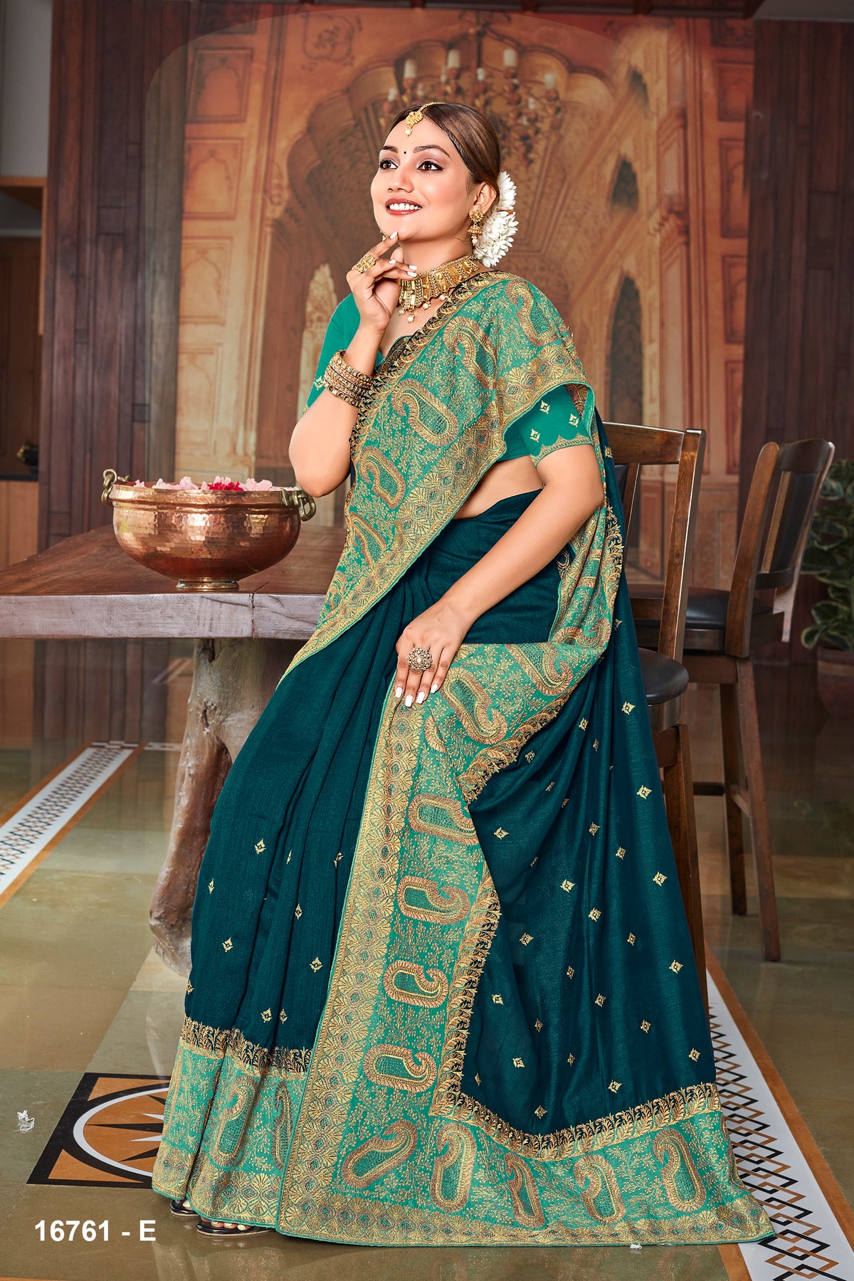 Peacock Green Designer Embroidery SIlk Saree With Siroshki Work And Heavy Border