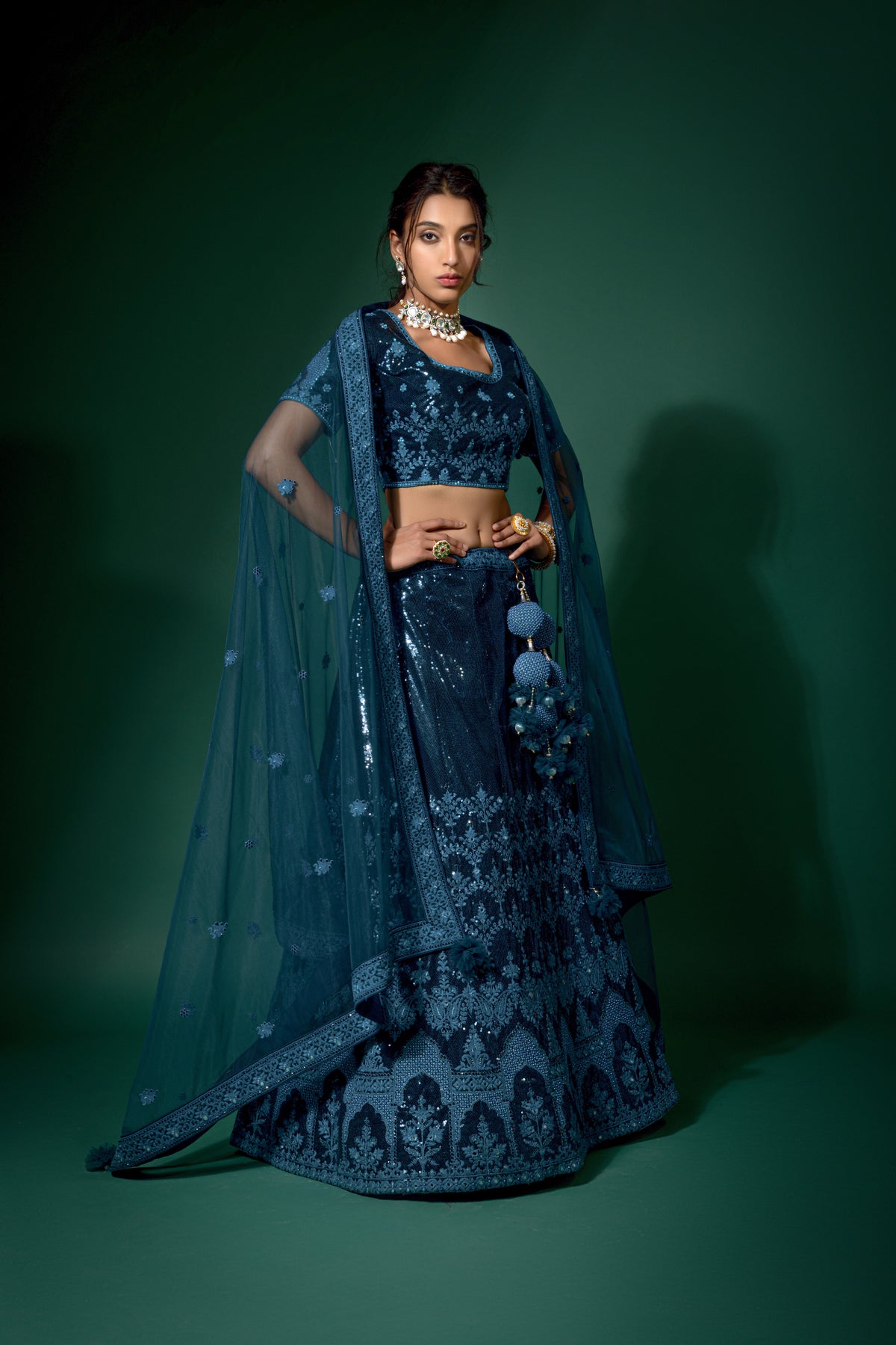 Navy Blue And Peach Pink Net Embroidered Fancy Semi Stitched Lehenga And Unstitched Choli