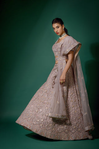 Lavender Net Semi-Stitched Lehenga And Unstitched choli: Flaunt Your Individuality.