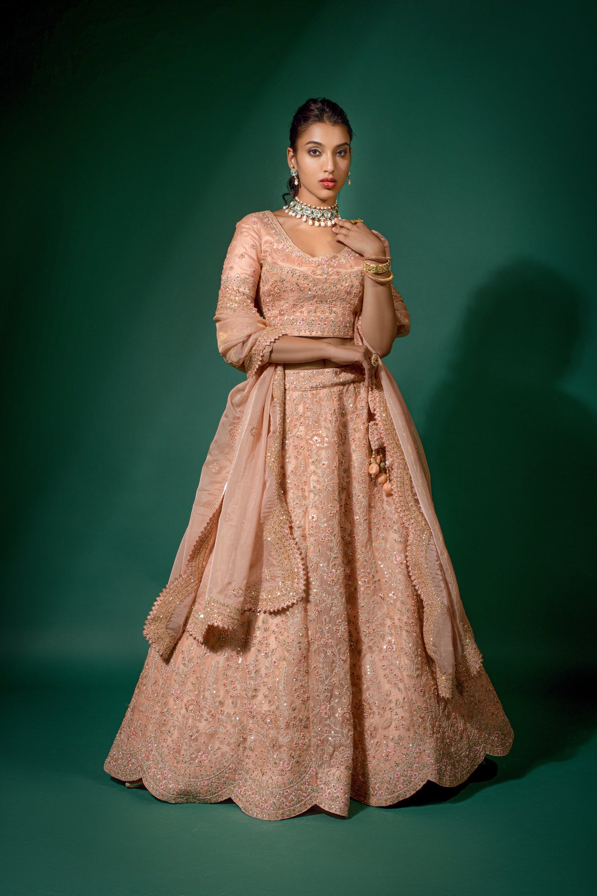 Peach Net Embroidered Semi Stitched Lehenga And Unstitched Choli