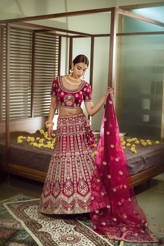 Magenta Purple Colour Velvet Semi Stiched Traditional Lehenga Choli With Net Dupatta.