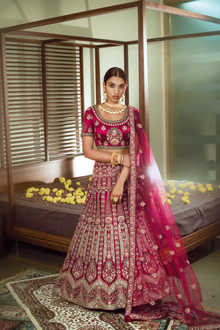 Magenta Purple Colour Velvet Semi Stiched Traditional Lehenga Choli With Net Dupatta.