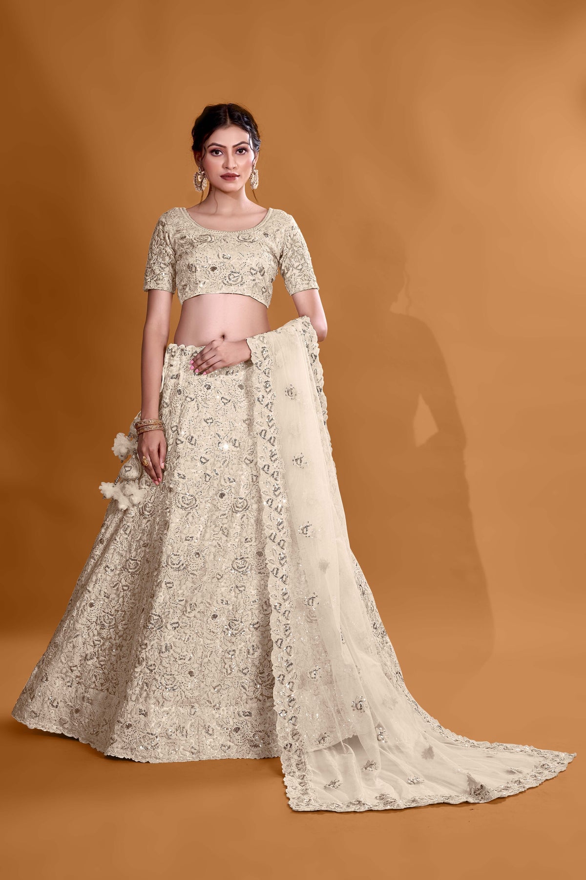 Off White Luxurious Luminosity Full Sequence Velvet Semi Stitched Lehenga Choli With Net Dupatta