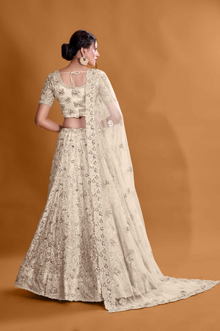 Off White Luxurious Luminosity Full Sequence Velvet Semi Stitched Lehenga Choli With Net Dupatta