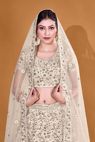 Off White Luxurious Luminosity Full Sequence Velvet Semi Stitched Lehenga Choli With Net Dupatta