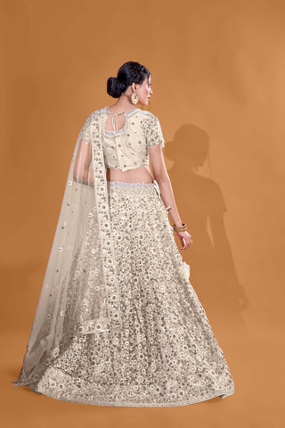 Off White Luxurious Luminosity Full Sequence Velvet Semi Stitched Lehenga Choli With Net Dupatta